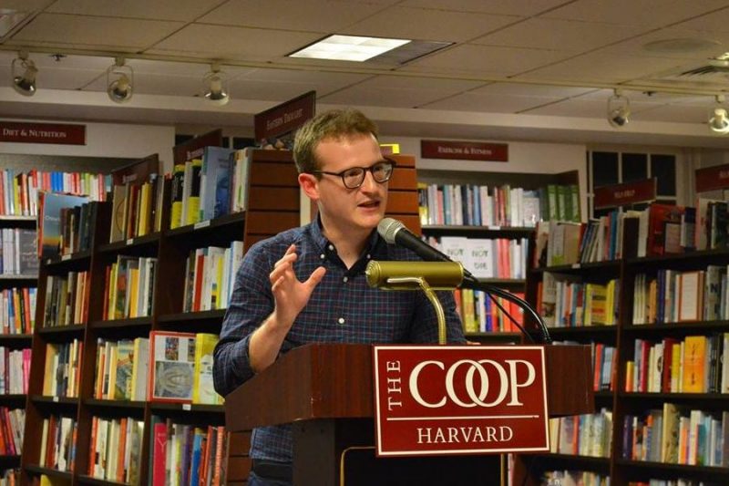 Adam Eichen speaking at an event